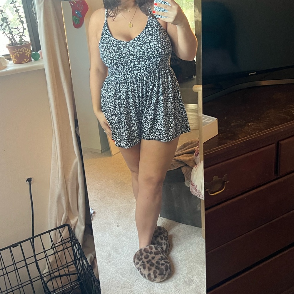 large Urban Outfitter Black Romper with White Flowers
